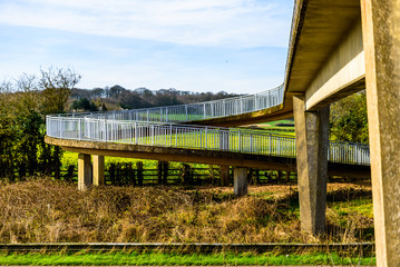 Day view pedestrian bridge over uk motorway