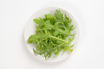 plate of fresh arugula