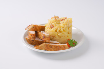 mashed potatoes with roasted pork