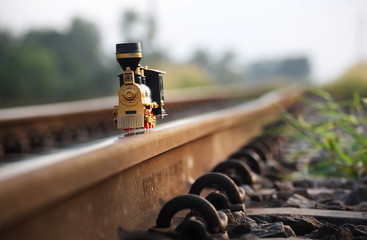 Vintage train toy model on rail.Shallow depth of field composition.