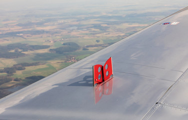 Exhaust brake pads on the wing