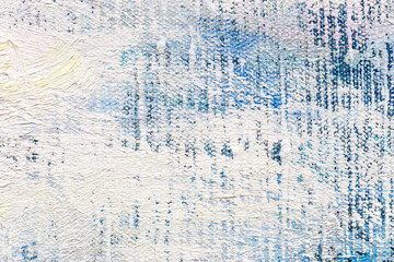 abstract hand painted canvas background with white brush strokes on blue background