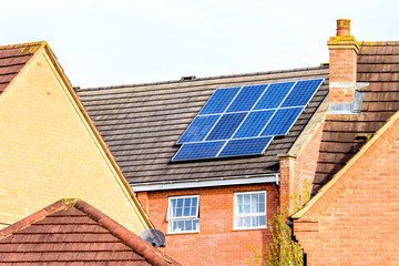 Fototapeta premium UK Solar Energy Panel on Sunny Roof