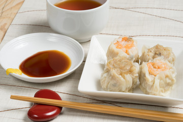 Steamed dumplings on white background - 145427111