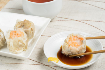 Steamed shrimp dumplings on white background - 145427364