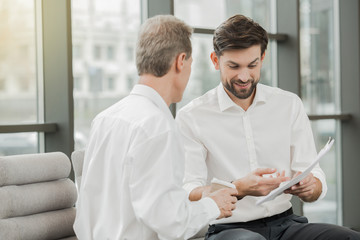 Fototapeta premium Stylish businessmen working in office