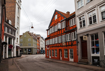 Fototapeta na wymiar COPENHAGEN, DENMARK - 26 JUN 2016: Street view of quarters of city center, old and modern architecture