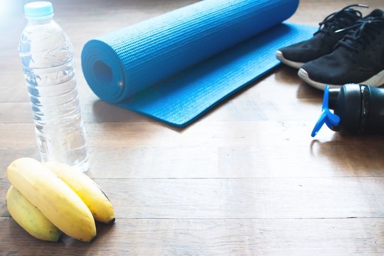 Healthy lifestyle objects on wooden floor