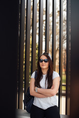 Woman standing on the street with blur background