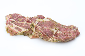 Pork chop, marinated. Isolated on the white background.