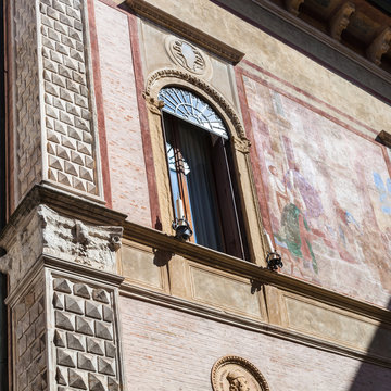 wall with fresco on medieval palazzo in Vicenza