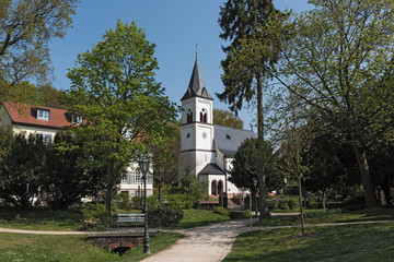 Fototapeta na wymiar Quellenpark with Evangelical Church in Bad Soden am Taunus, Germany