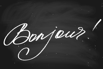 Bonjour! Hello in French. Handwritten text, chalk on a blackboard, vector. Each word is on the separate layer © anna_sea