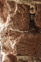 Old worn old brick wall in grunge style, The textured background. Photo pattern.