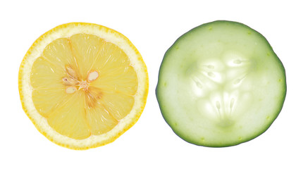 sliced cucumber and lemons isolated on white background. © siwaporn999
