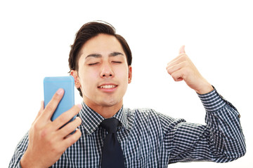 ガッツポーズのビジネスマン