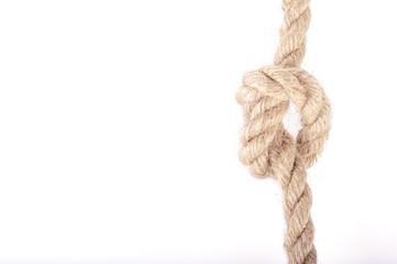 Rope knot as a strong nautical marine line tied together as a symbol for trust and strenght