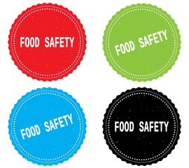 FOOD SAFETY text, on round wavy border stamp badge.