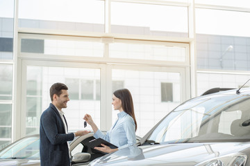 Young People in a Car Rental Service Transportation Concept