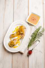 chicken legs cooked with saffron sauce