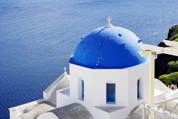Fototapeta na wymiar Blue dome Church in Oia, Santorini, Greece