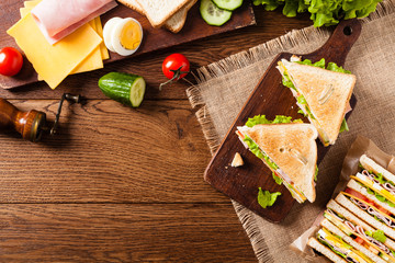 Delicious toast sandwich with ham, cheese, egg and vegetables.