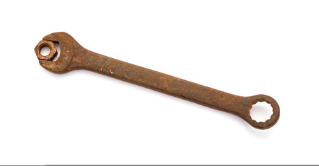 rusty nut and spanner on a white background