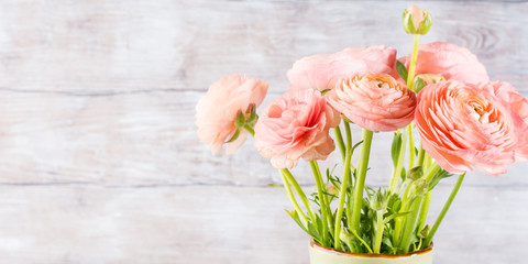 Beautiful pink ranunculus bouquet. Woman mother's day wedding. Holiday elegant bunch of flowers.