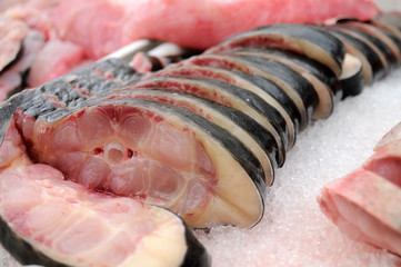 Raw Fish steaks at market