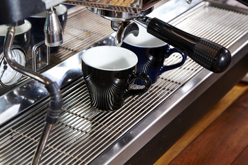 Fototapeta na wymiar Barista Machine doing Coffee