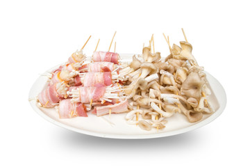 Mushrooms before grilled isolated on white background., This has clipping path.