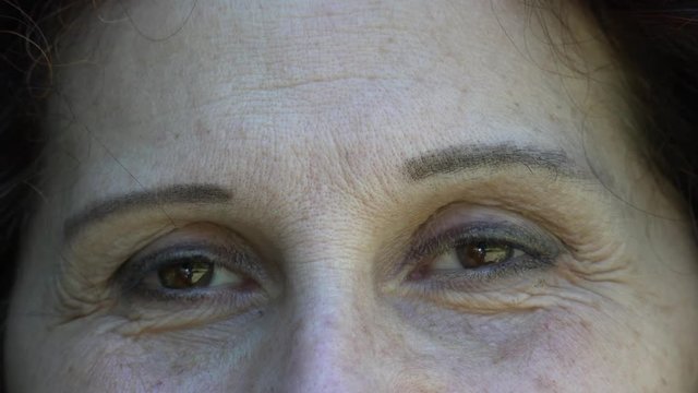 attractive eyes of mature Caucasian woman With Arabic or Middle Eastern somatic features