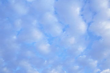 blue sky is covered by white clouds