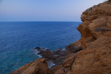 Fototapeta na wymiar Rocky beach on the Mediterranean sea in Greece