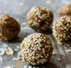 Oats sesame protein balls / Low fat energy bites with oatmeal nuts sesame, selective focus
