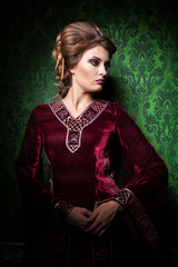 Gorgeous beautiful woman dressed vintage clothes in retro interior. Rococo period. Luxury and high class