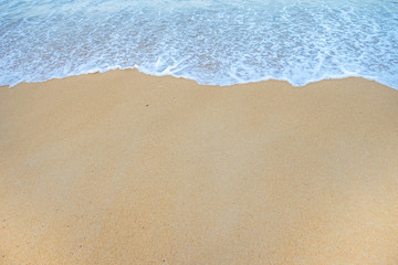 Fototapeta na wymiar Soft Wave Of Ocean On Sandy Beach. Background. Selective
