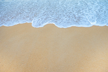 Naklejka na ściany i meble Soft Wave Of Ocean On Sandy Beach. Background. Selective