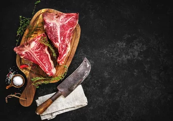 Zelfklevend Fotobehang Raw dry aged t-bone steaks for grill © Alexander Raths
