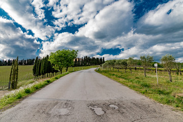 Panorama of green chianti hills in tuscany italy in spring, land of red wine and cypresses