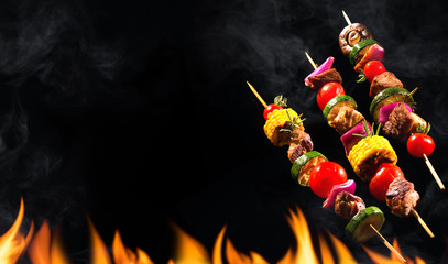 Collage of grilled meat skewers and vegetables