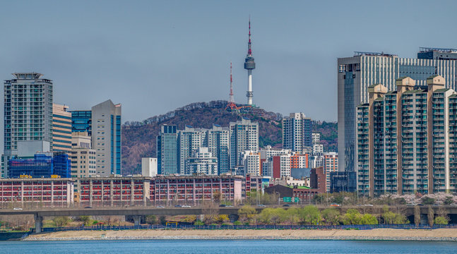 Seoul Tower and city skyline with the Han River