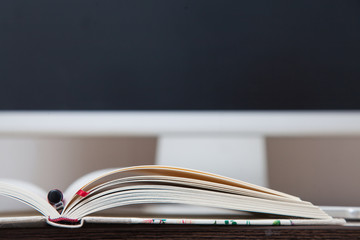 Paper notebook pen computer monitor