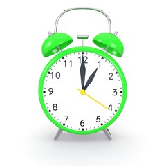 Green alarm clock on an isolated background