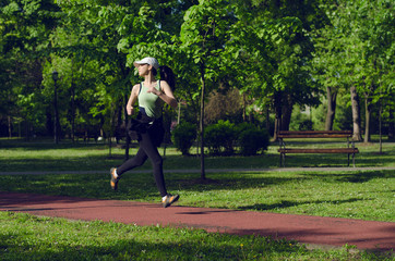 moment,  girl running in the distance at which the professional track runner
