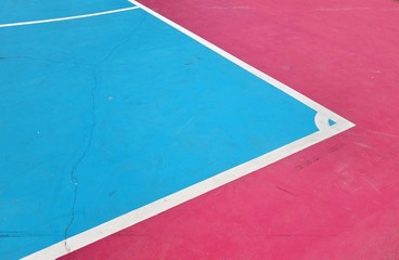 Fototapeta premium White line on colorful concrete floor of outdoor basketball court.