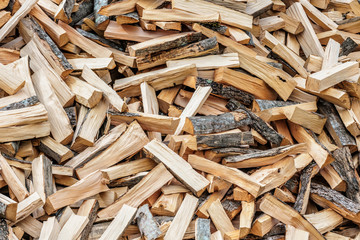 Сhopped firewood background texture