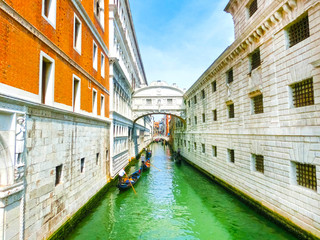 Fototapeta na wymiar Venice, Italy - Gondolas on Canal Grande in a beautiful summer day