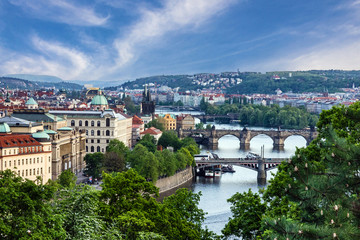 Fototapeta na wymiar Prague bridges city sunset panorama, Czech Republic