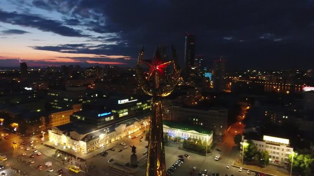 Yekaterinburg government building star in Stalin high rise skyscrapers Moscow style. Night city illumination. Aerial helicopter drone flight above. Ultrahd 4k fifa 2018